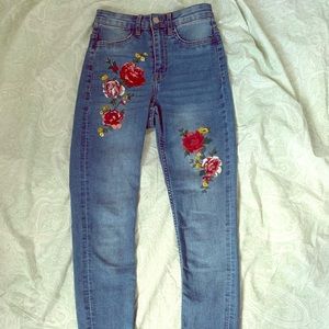 H&M painted floral skinny jeans